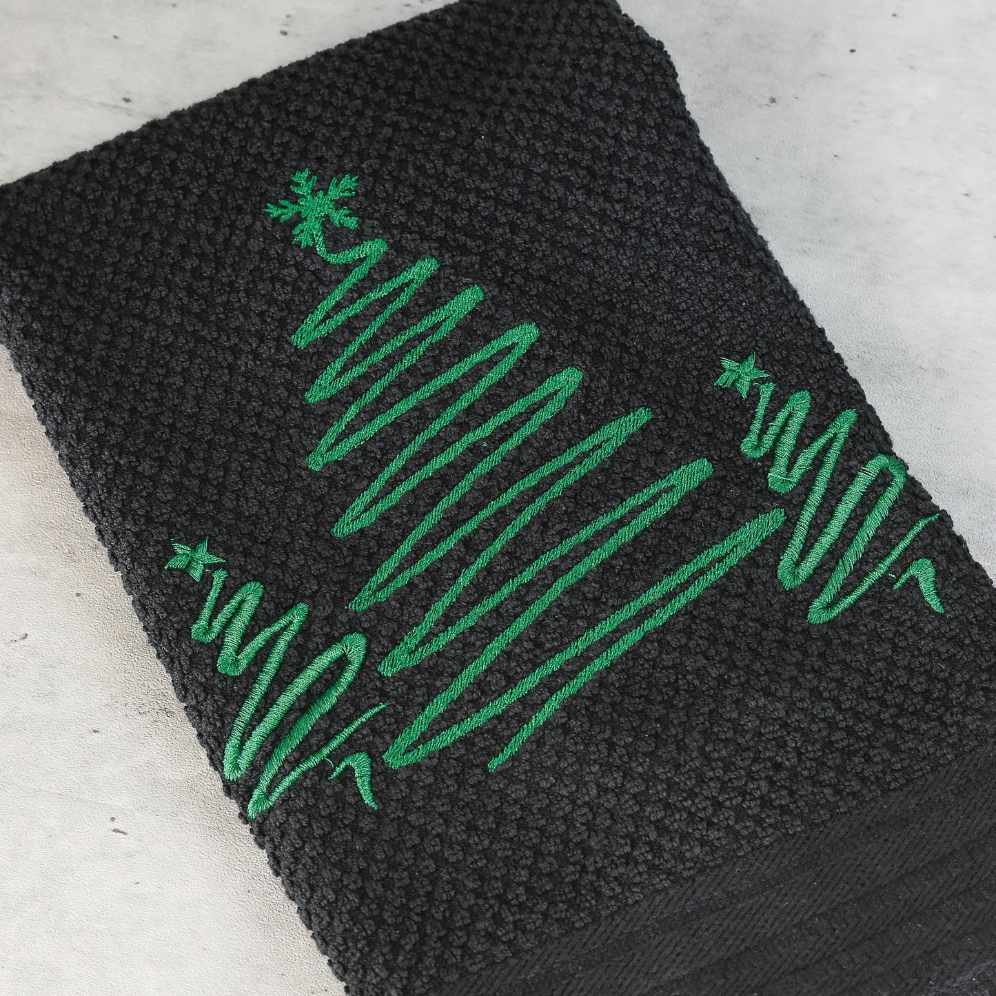 Embroidered Squiggle Christmas Tree on black 100% cotton waffle weave toweling