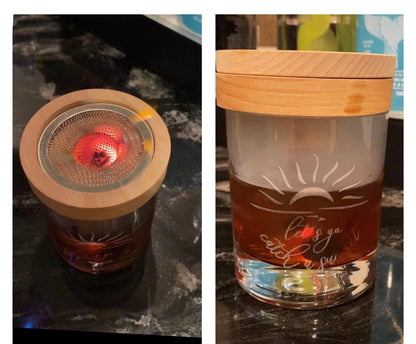 Custom logo glass with old fashion drink demonstrating use of smoking kit.