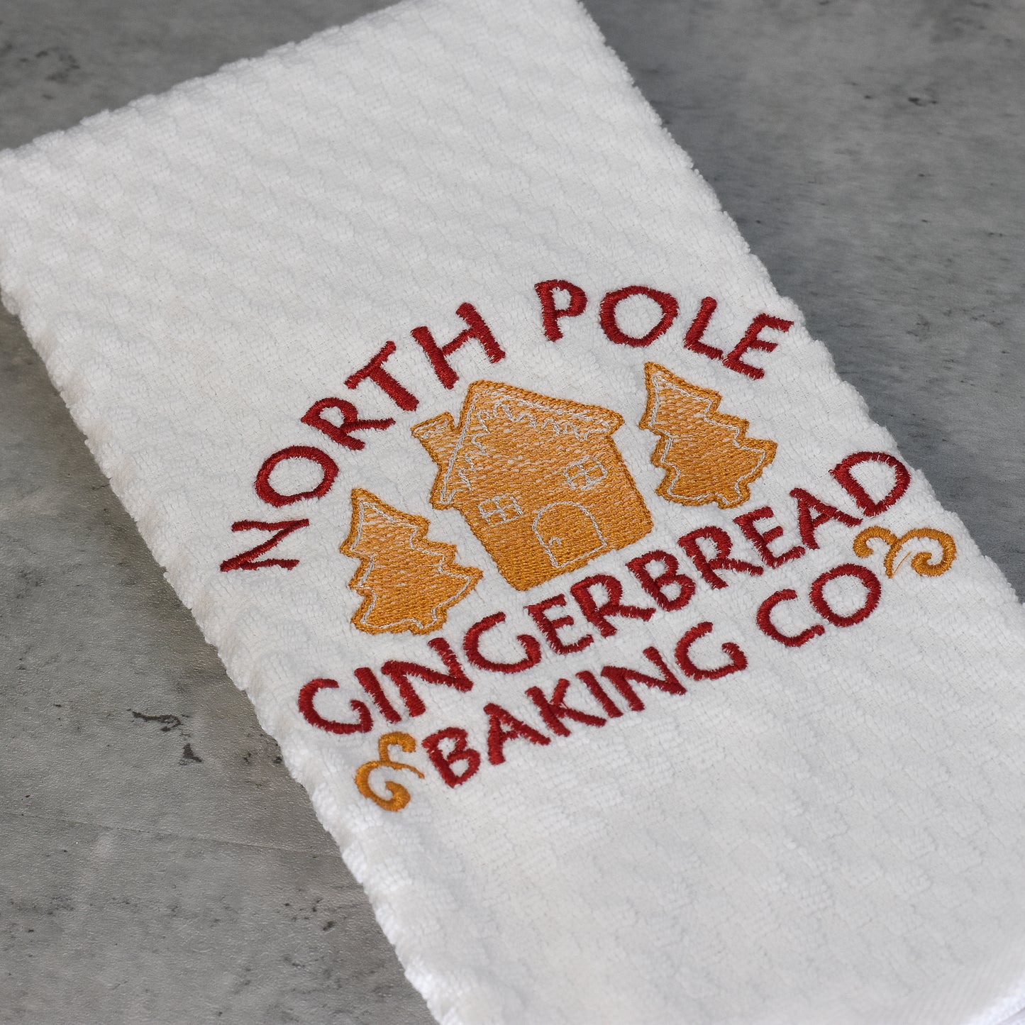 North Pole Gingerbread Baking Co Kitchen Towel - Embroidered