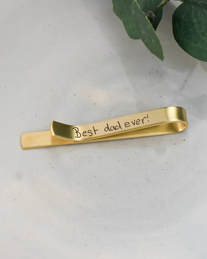 Custom engraved hand written message for dad on Father's Day engraved in gold brass.  Traditional tie accessory with personal touch.