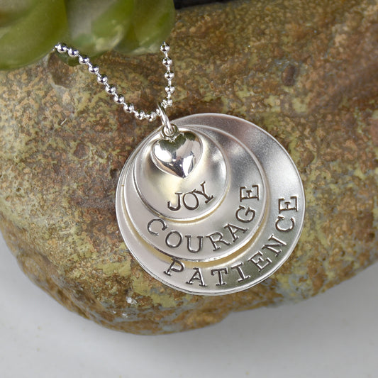 3 layer sterling silver necklace with custom wording of joy, courage and patience with puffy heart charm at top