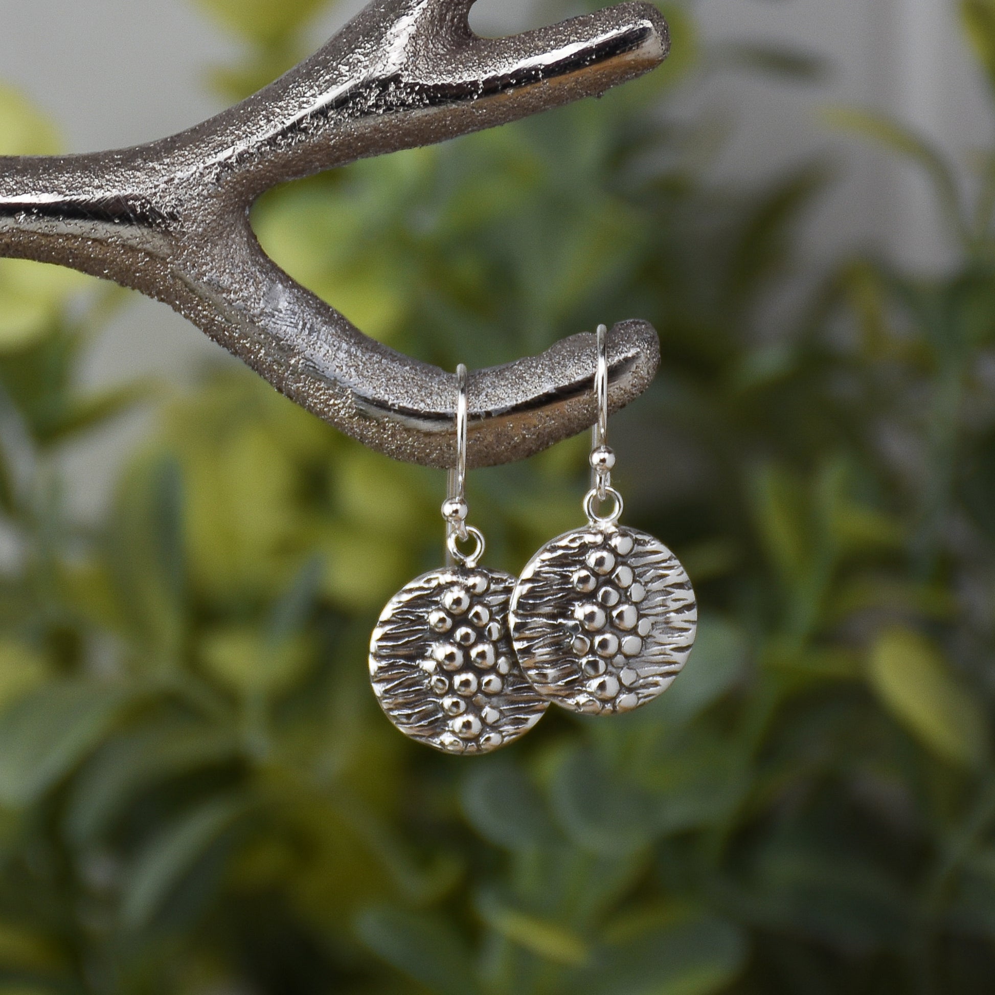 sterling silver earrings with river rock design handcrafted from vintage jewelry dies with hydraulic press